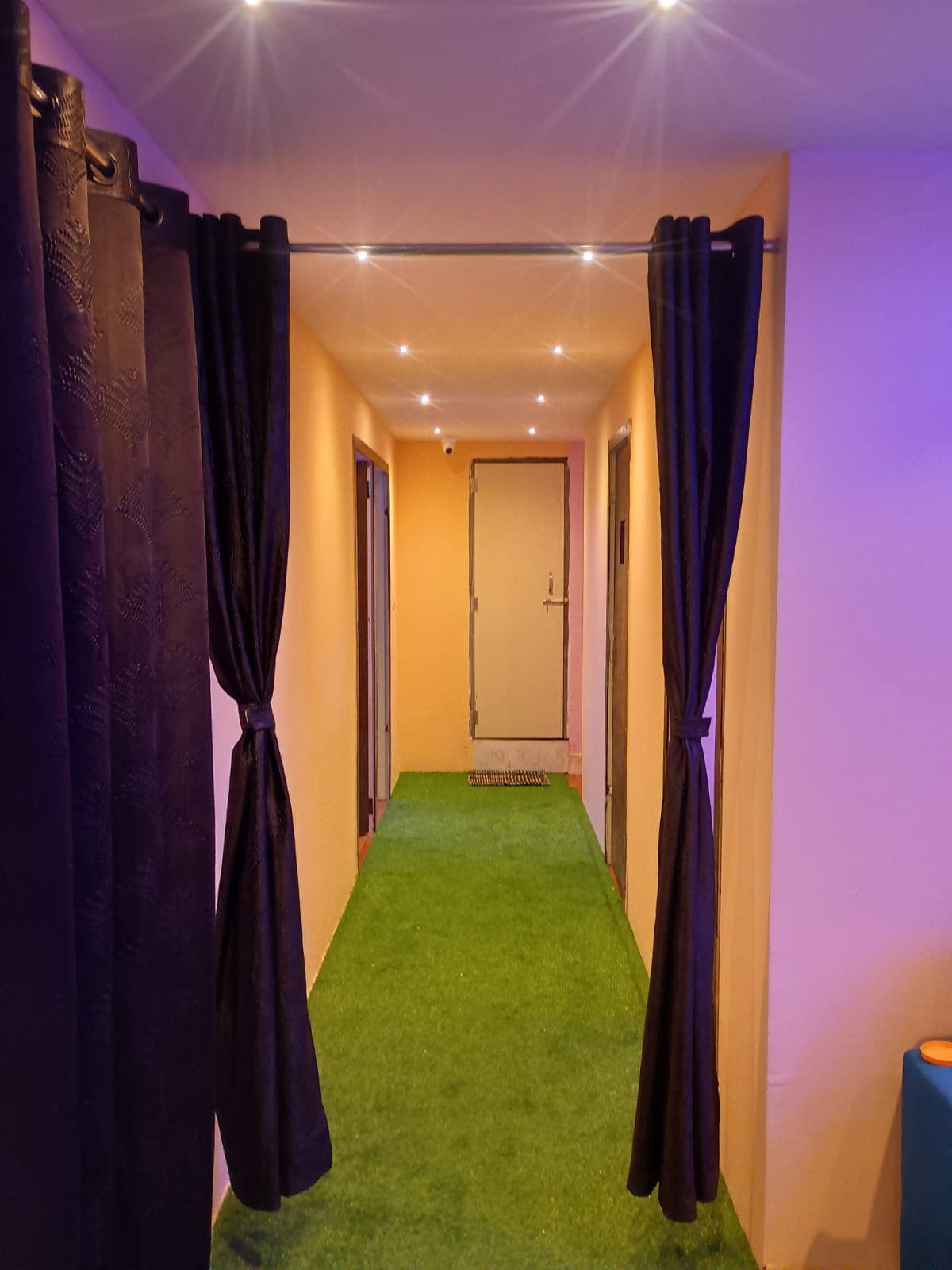 The hallway leading to each private suite